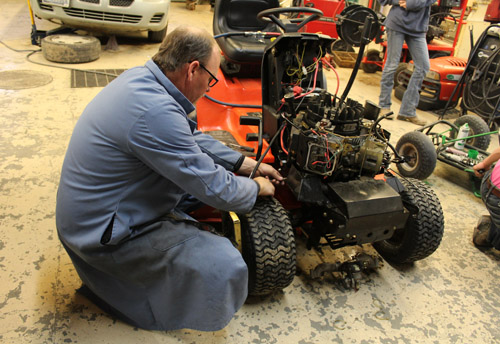 Teacher working on go kart