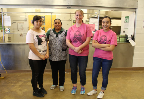 Students and staff posing for a photo