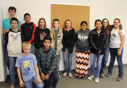 Group of happy students in hallway