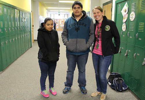 Students and teacher near lockers