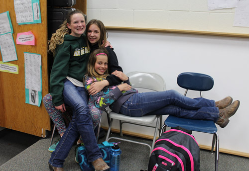 Students posing in class